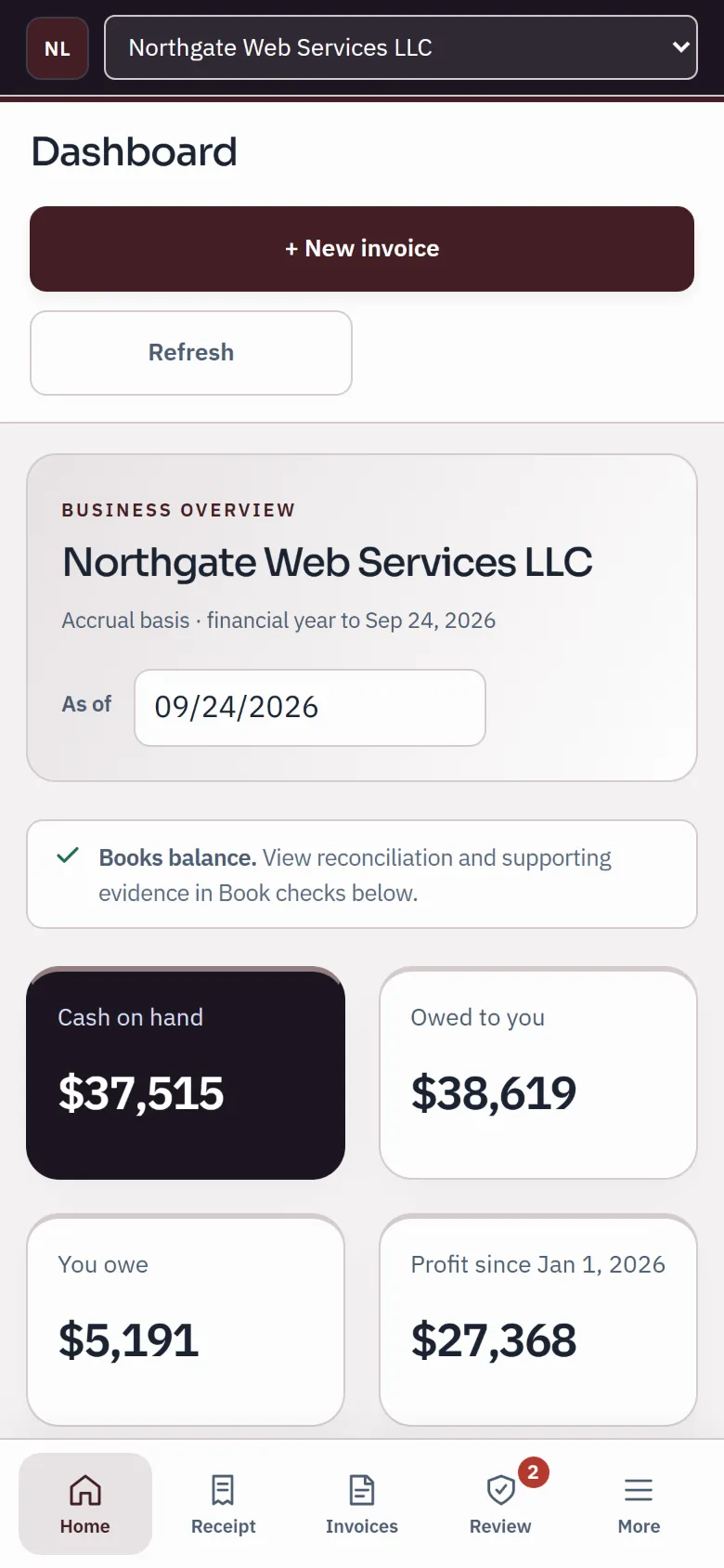 The sample dashboard on a phone: cash on hand, owed to you, you owe and profit, with the phone task bar.